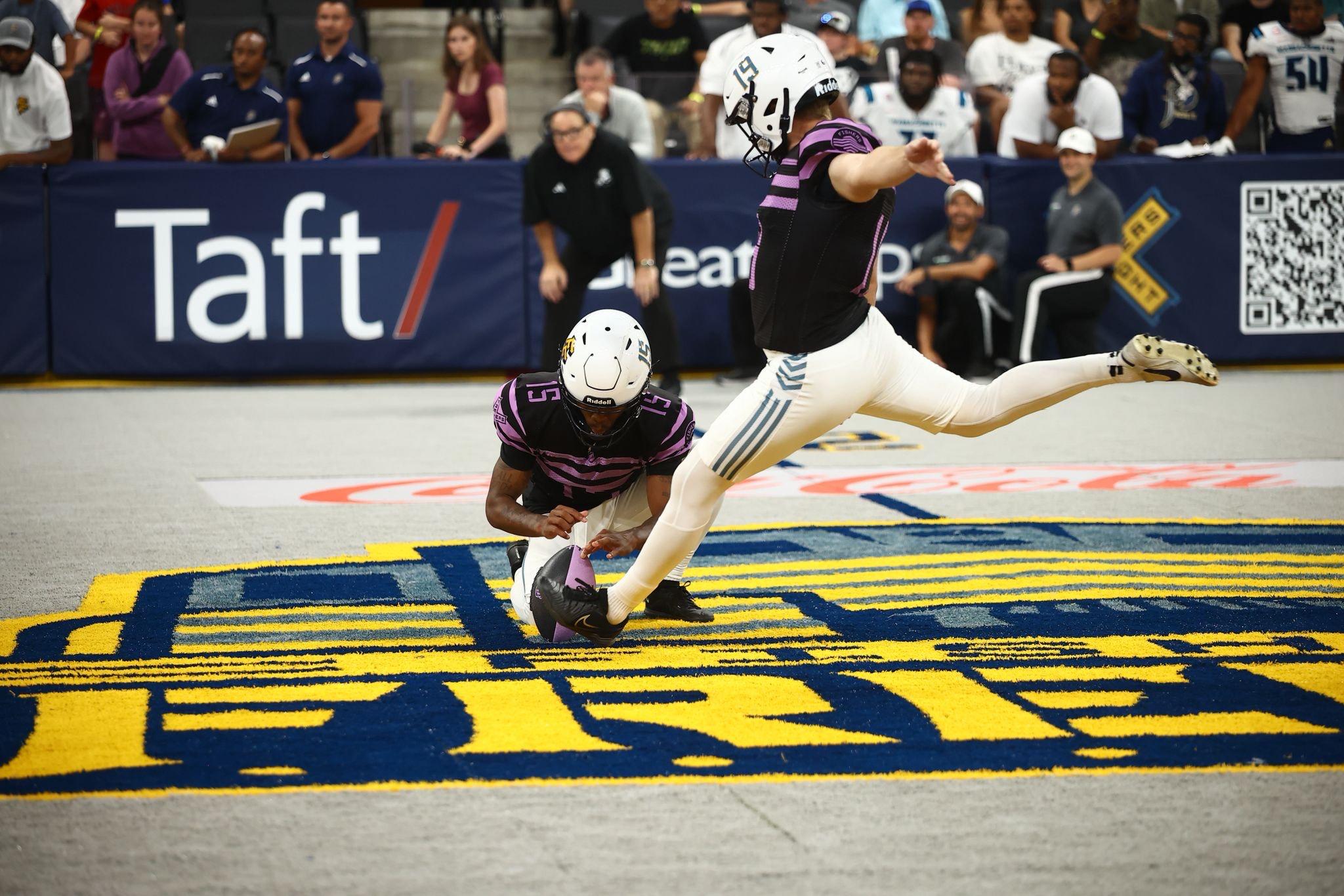 Calum Sutherland of Indy Freight Football in action, executing a precise field goal after his focused pregame ritual